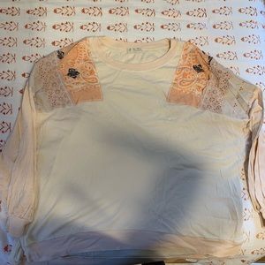 Free people size large tee with patchwork details